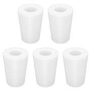 Five white cylindrical filters on a white background 0#