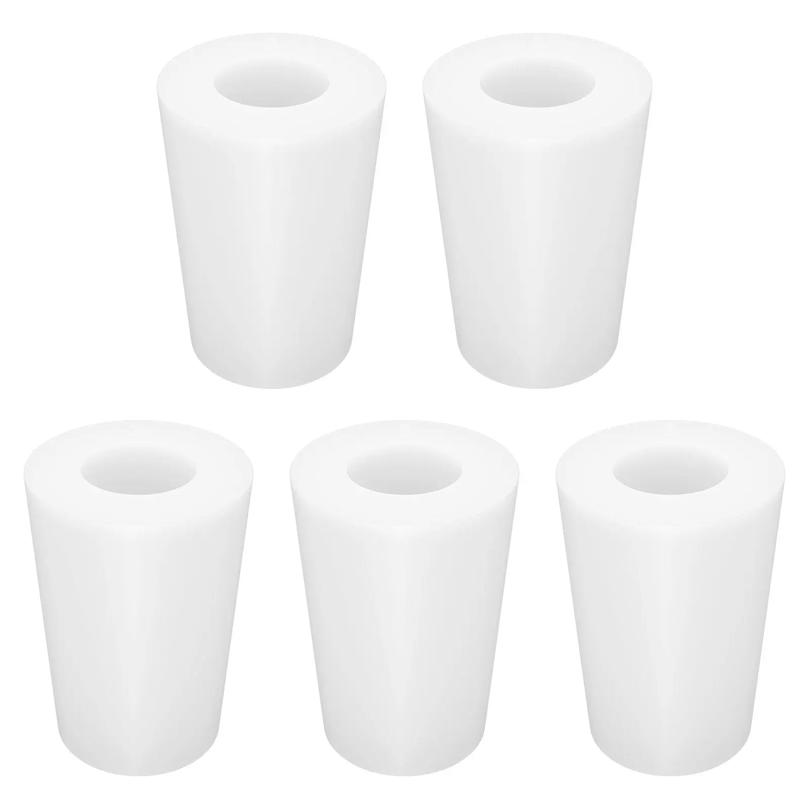 Five white cylindrical filters on a white background 0#