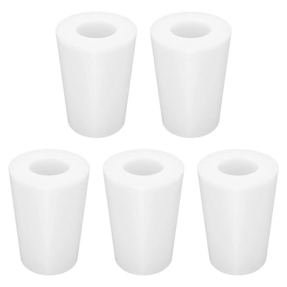 Five white cylindrical filters on a white background 0#