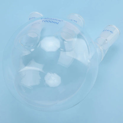 Flat bottom detail of 3 neck borosilicate glass flask, stable base design