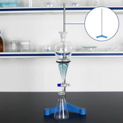 Laboratory tripod stand combined with glassware setup for experimental procedures