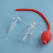 Rubber squeeze bulb attached to a color-developing spray bottle for manual spraying